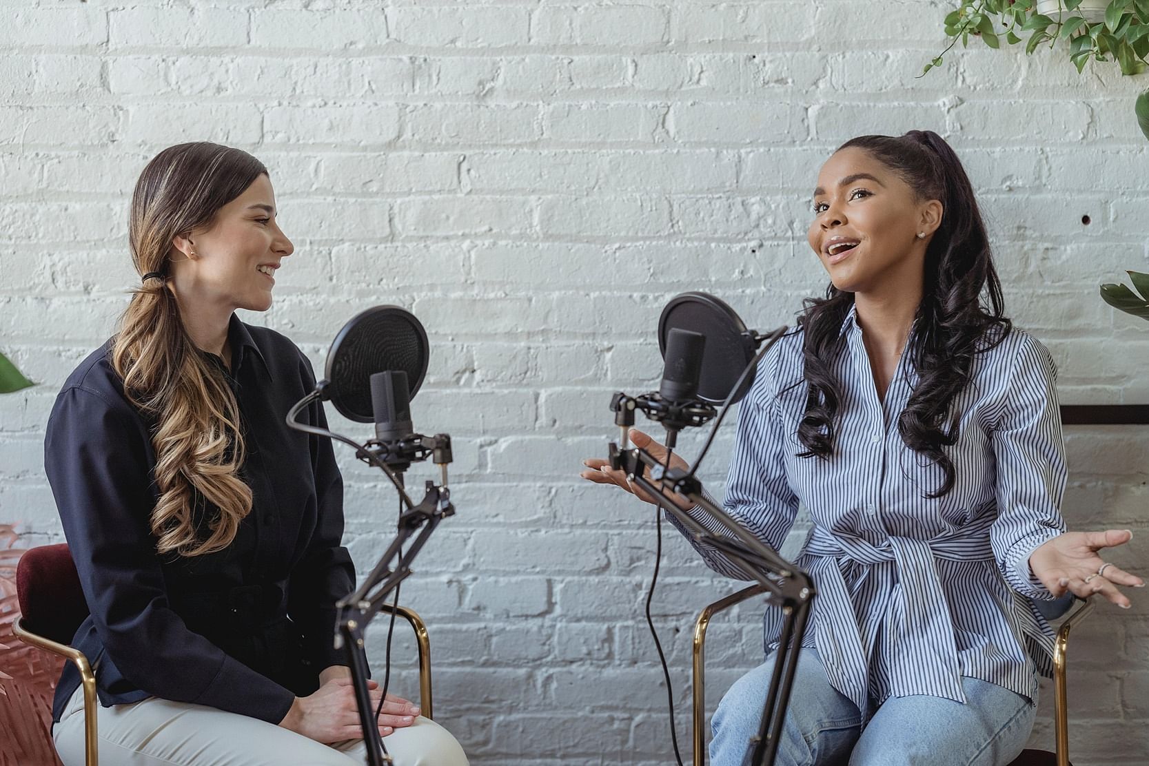 Two girls hosting a podcast